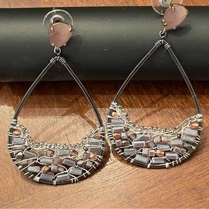 Shiny light pink stones in silver drop hoops